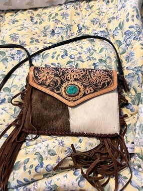 Fringed Two-Tone Hair-On Hide Crossbody with Turquoise Accent
